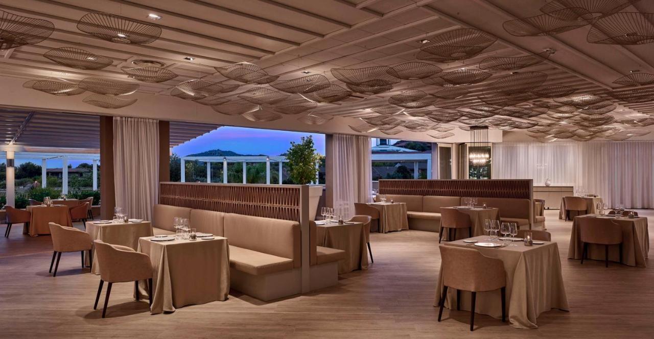 Baia Di Chia Resort Sardinia, Curio Collection By Hilton Luaran gambar